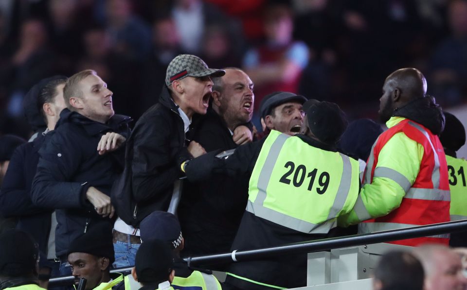 Clashes rage between West Ham and Chelsea fans at the Olympic Stadium