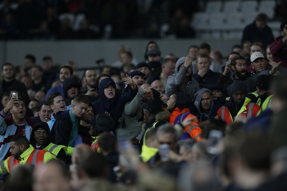  Supporters clashed in the stands as stewards struggled to contain them