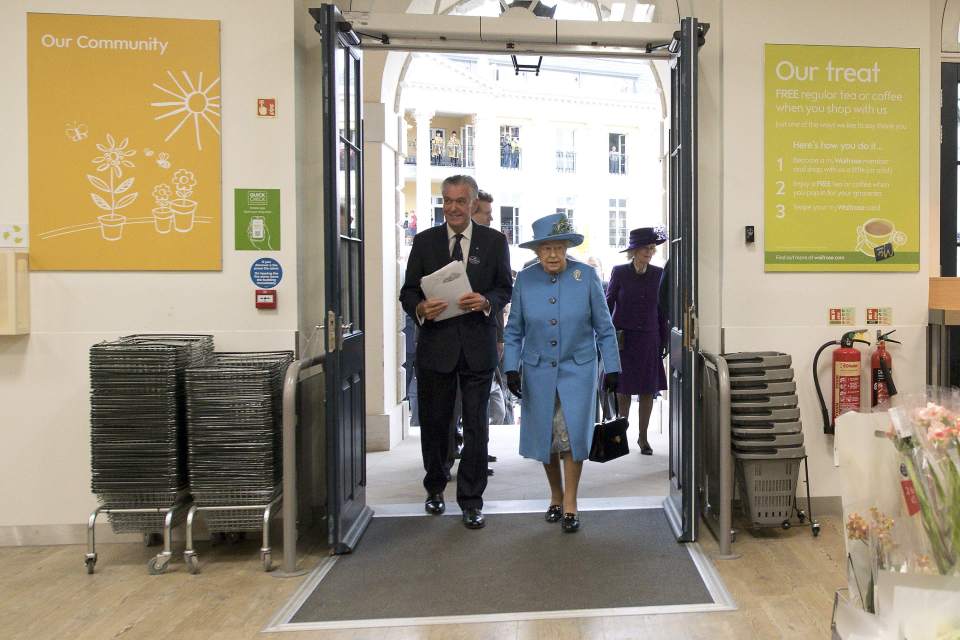 Britain's Queen Elizabeth arrives to look around a Waitrose supermarket during a visit to the town of Poundbury