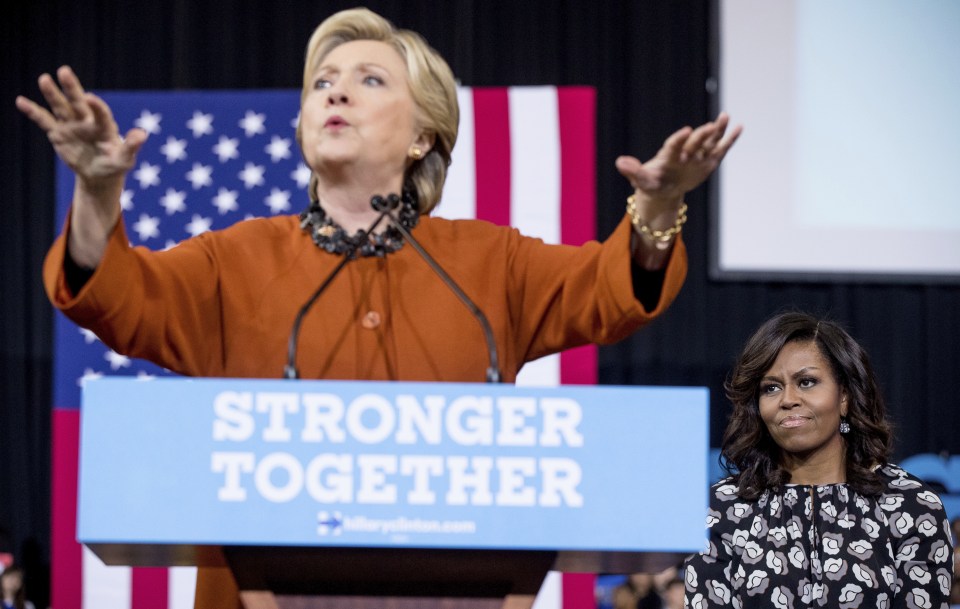  Democratic presidential candidate Hillary Clinton speaks at a campaign rally at Wake Forest University in Winston in front of first lady Michelle Obama