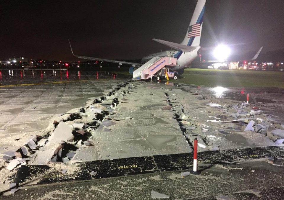 This incredible photograph shows the airport runway was torn to shreds in the crash