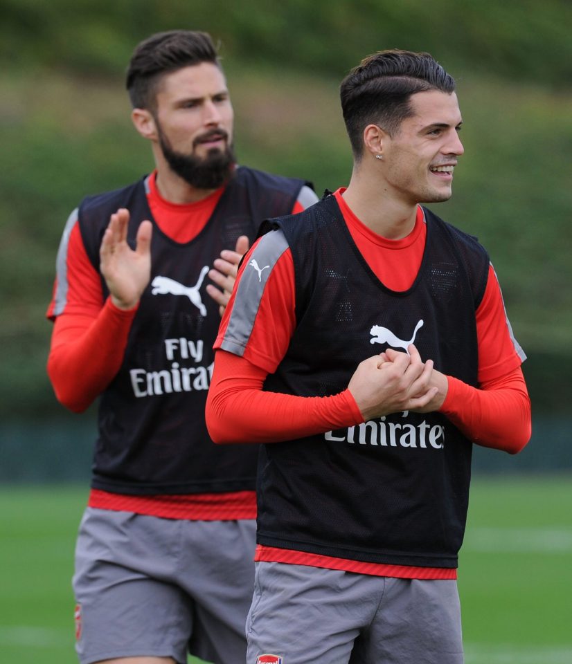 Granit Xhaka and Giroud were all smiles during the training session