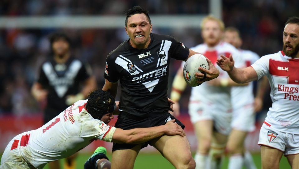  Jonny Lomax tackles Kiwis star Jordan Rapana as England are pipped late on