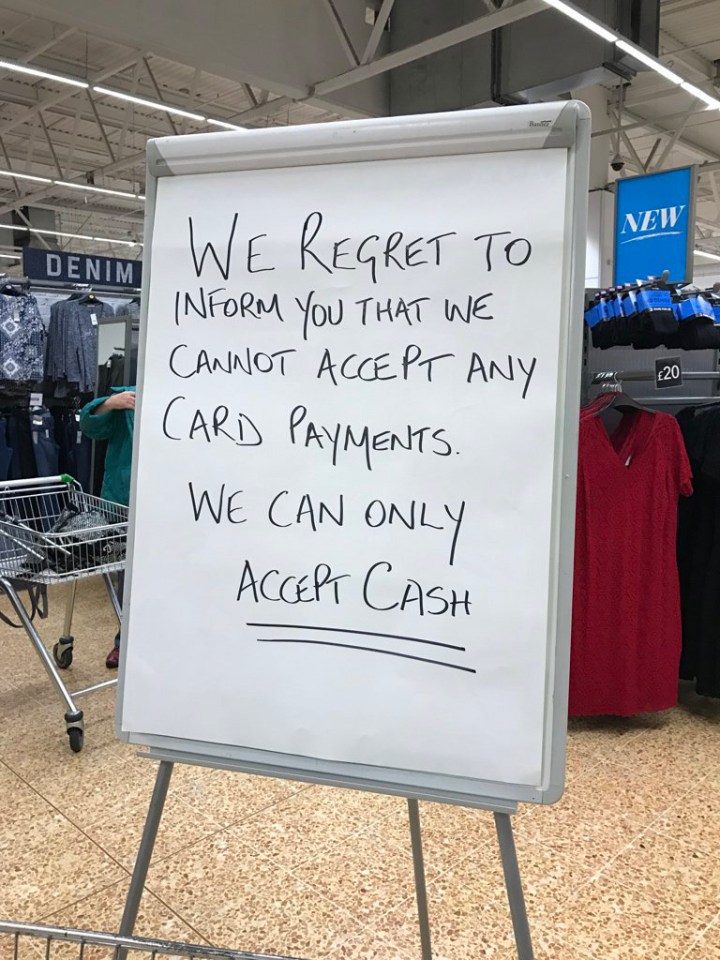  A notice welcoming shoppers in ASDA today telling them that they needed cash