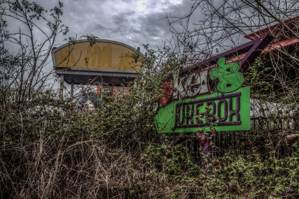 Overgrown... Vegetation has reclaimed the amusement park