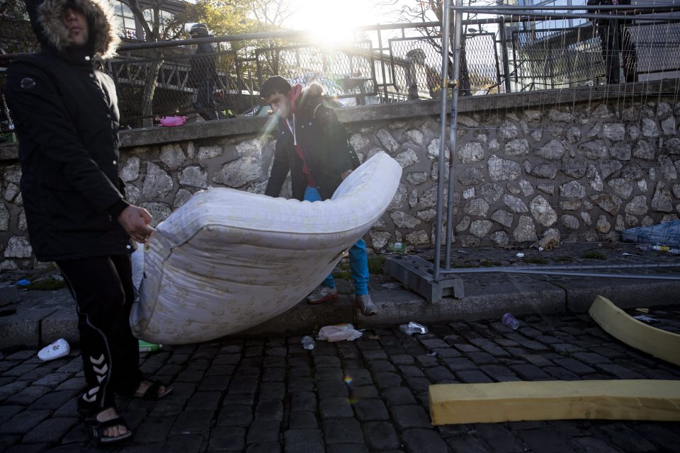  The Paris camp's inhabitants rushed to save what they could as police moved in