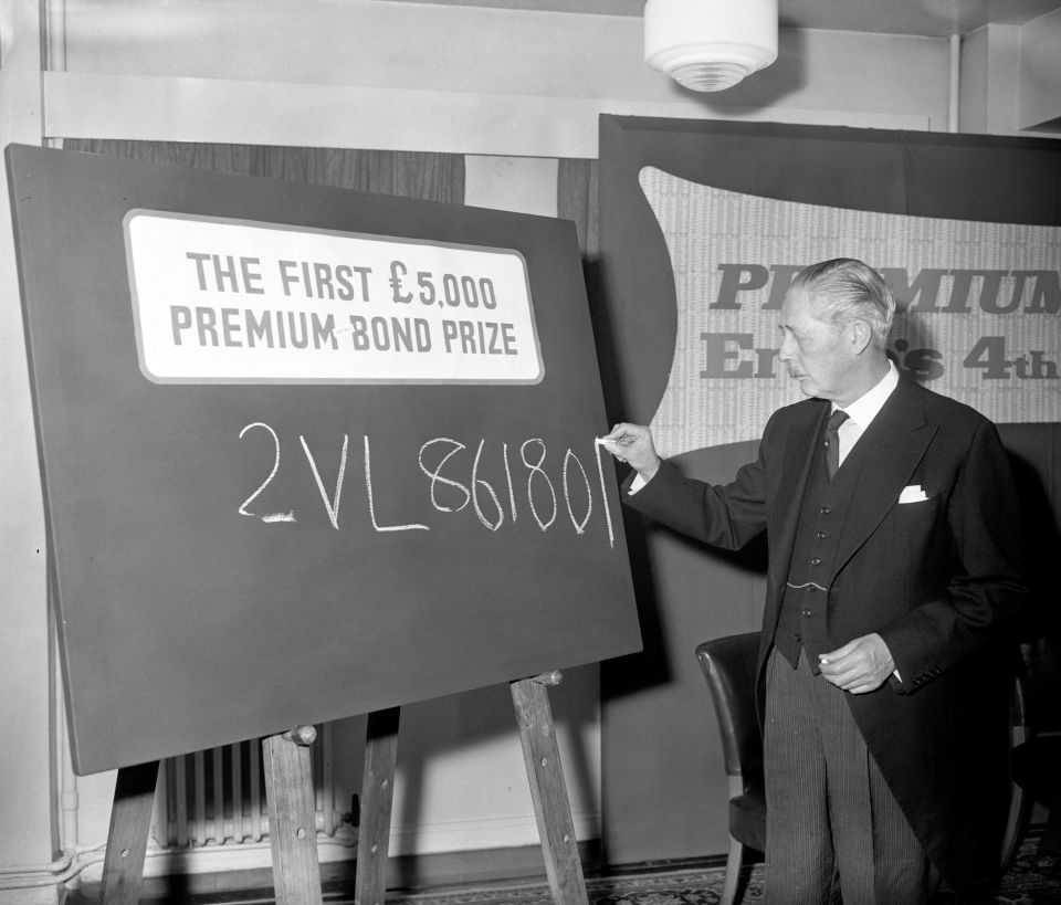 Minister Harold Macmillan writing the number of the first £5,000 Premium Bonds prize in the 42nd draw 