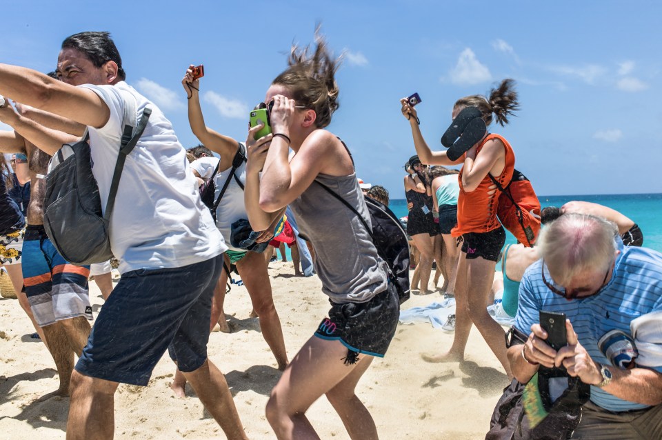 Crowds get blasted by jet engines as they snap away