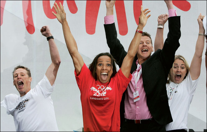  Dame Kelly Holmes and Steve Cram jump for joy in Trafalgar Square as they hear the news that London has won the right to stage the 2012 Olympics.