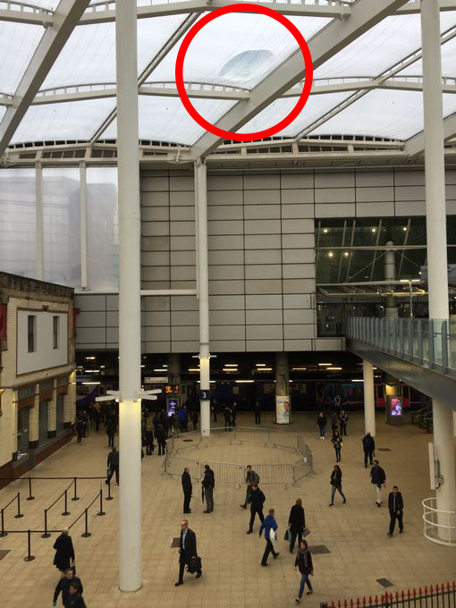  Two people suffered head injuries after a build-up of rain caused the roof to collapse at Victoria station in Manchester