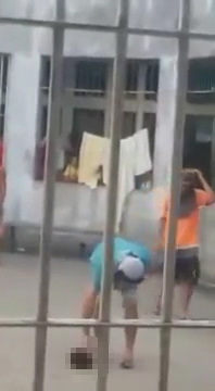 The horrifying moment Brazilian inmates behead a prisoner... and play football with his HEAD