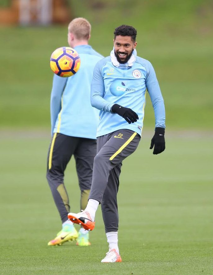  Gael Clichy wears a snood in City training