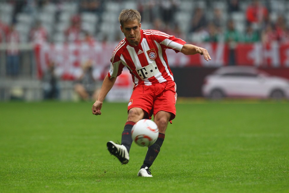 MUNICH, GERMANY - SEPTEMBER 18: Philipp Lahm of Muenchen runs with the ball during the Bundesliga match between FC Bayern Muenchen and 1. FC Koeln at Allianz Arena on September 18, 2010 in Munich, Germany. (Photo by Alexander Hassenstein/Bongarts/Getty Images)