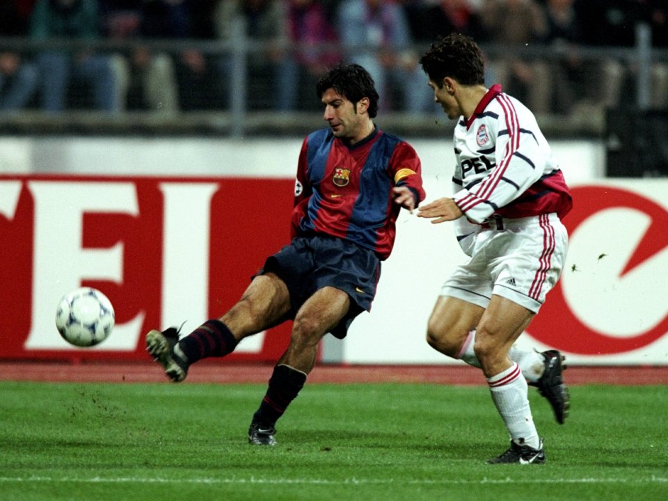 21 Oct 1998: Barcelona captain Luis Figo whips in a cross past Bixente Lizarazu of Bayern Munich during the UEFA Champions League match at the Olympiastadion in Munich, Germany. Bayern won 1-0. Mandatory Credit: Phil Cole /Allsport