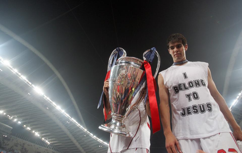 Athens, GREECE: AC Milan's Brazilian midfielder Kaka poses with the trophy at the end of the Champions League final football match against Liverpool, at the Olympic Stadium, in Athens, 23 May 2007. AC Milan won 2-1. AFP PHOTO / MUSTAFA OZER (Photo credit should read MUSTAFA OZER/AFP/Getty Images)