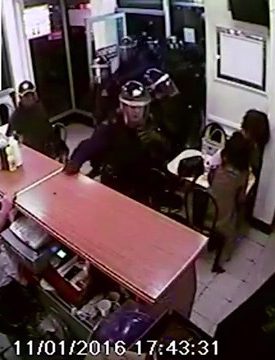  Diners in the corner are left shocked as the cops come bursting through the doors