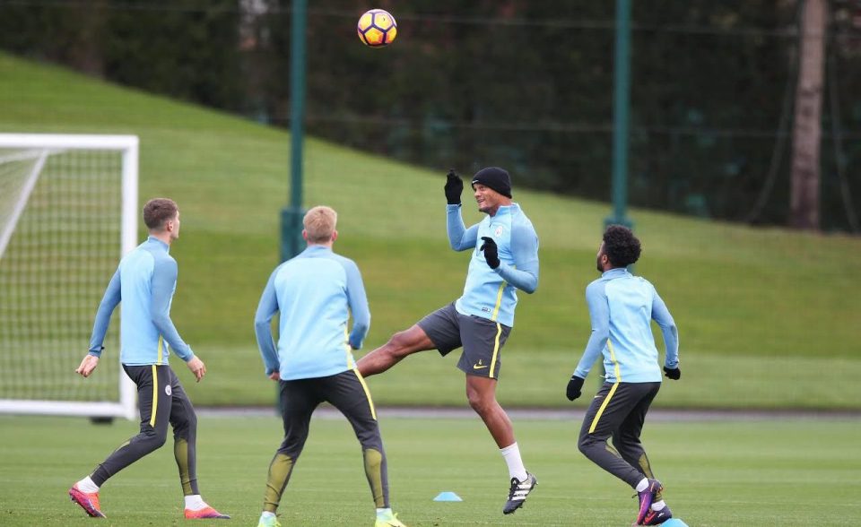  Vincent Kompany jumps for a header as City prepare for Middlesbrough clash