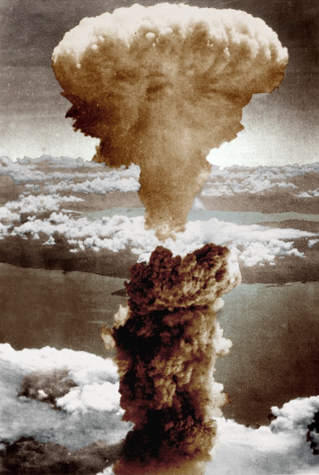 The mushroom cloud of the first atomic bomb over Nagasaki, Japan