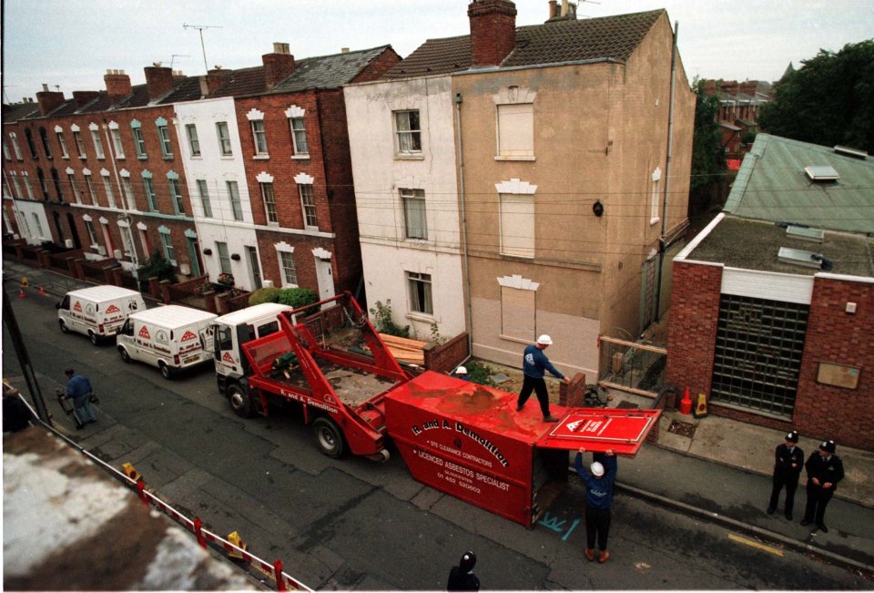  Workmen unload equipment outside the so called 'House of Horrors'