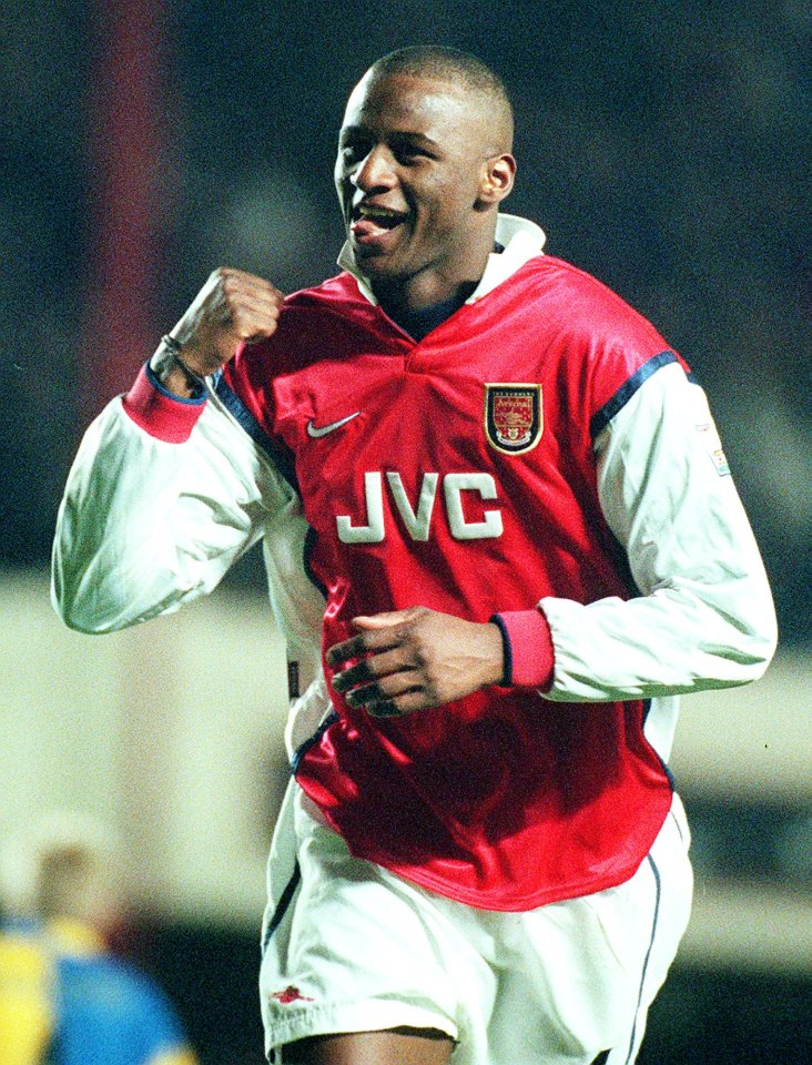 Arsenal's French international Patrick Vieira celebrates his first goal of the season, by scoring Arsenal's second goal against Leeds United during the English Premier League soccer match at Highbury London, Sunday Dec 20, 1998. Arsenal won the match by 3-1. (AP Photo/Alastair Grant)