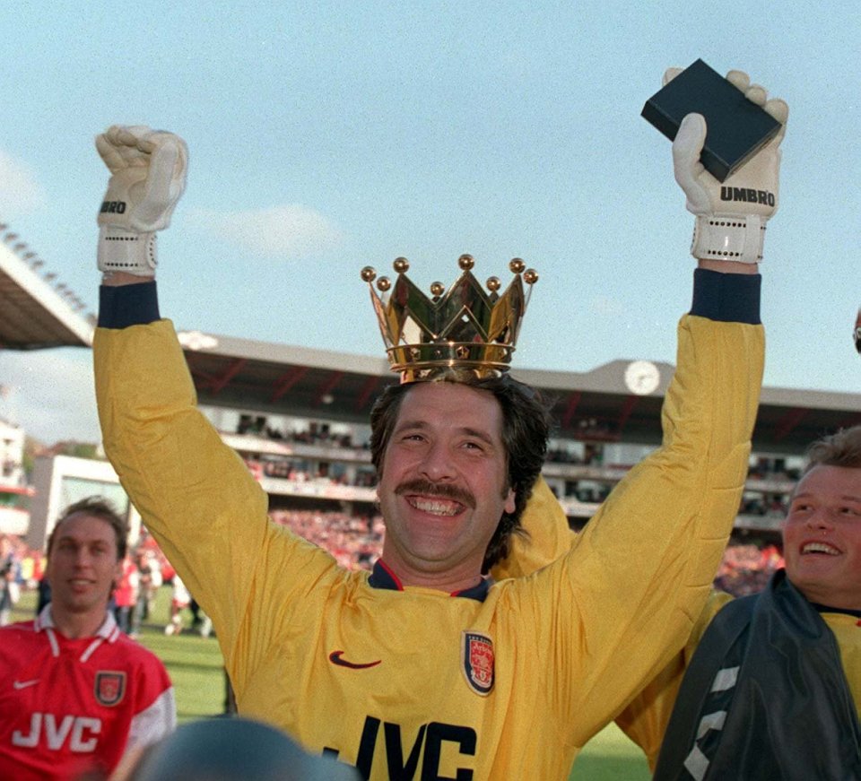 Headline: ARSENAL PREMIERSHIP CHAMPIONS 97-98. Caption: FEELING JUST CHAMPION..David Seaman (left) and boss Arsene Wenger celebrate their crowning glory as the happy Arsenal team salute their fans. ARSENAL V EVERTON...PIC EDDIE KEOGH.SEAMAN IS CROWNED THE CHAMPION. 05.05.1998 - used in Sun Sport's SALUTE TO ARSENAL pullout.