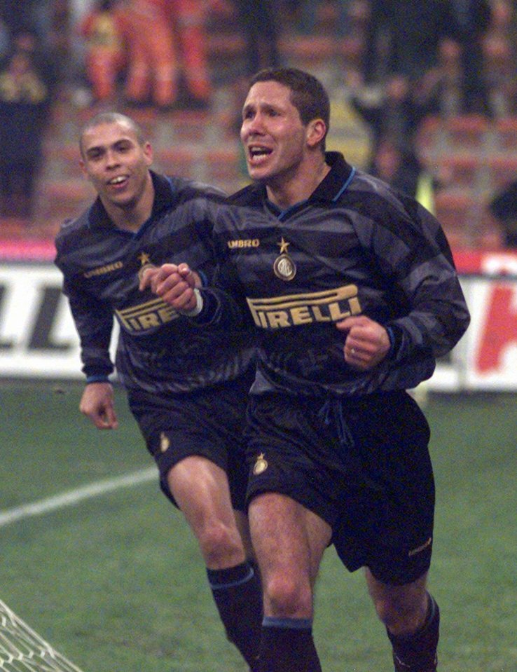 Inter Milan's Argentine striker Diego Simeone celebrates with his teammate Ronaldo during their Uefa Cup match against Strasbourg, at the Milan San Siro stadium, Tuesday, December 9, 1997. (AP Photo/Luca Bruno)