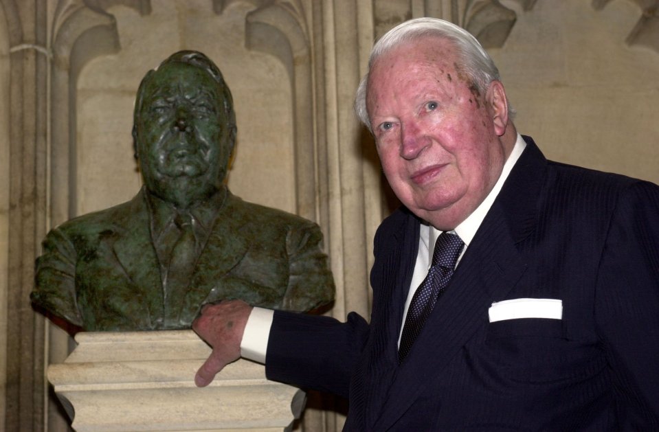 ormer British Prime Minister Sir Edward Heath stands by a bust of himself after it was unveiled at the House of Commons in London on Monday, May 12, 2003