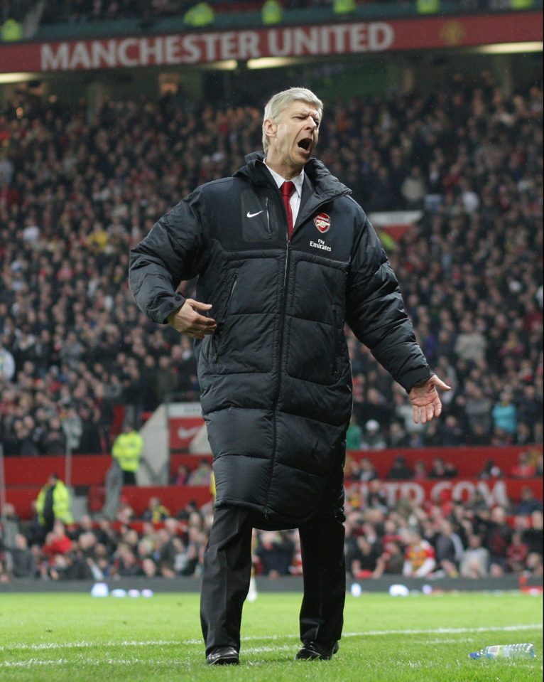 Arsene Wenger turns away in disgust as the Gunners lose in the FA Cup at Old Trafford in March 2011