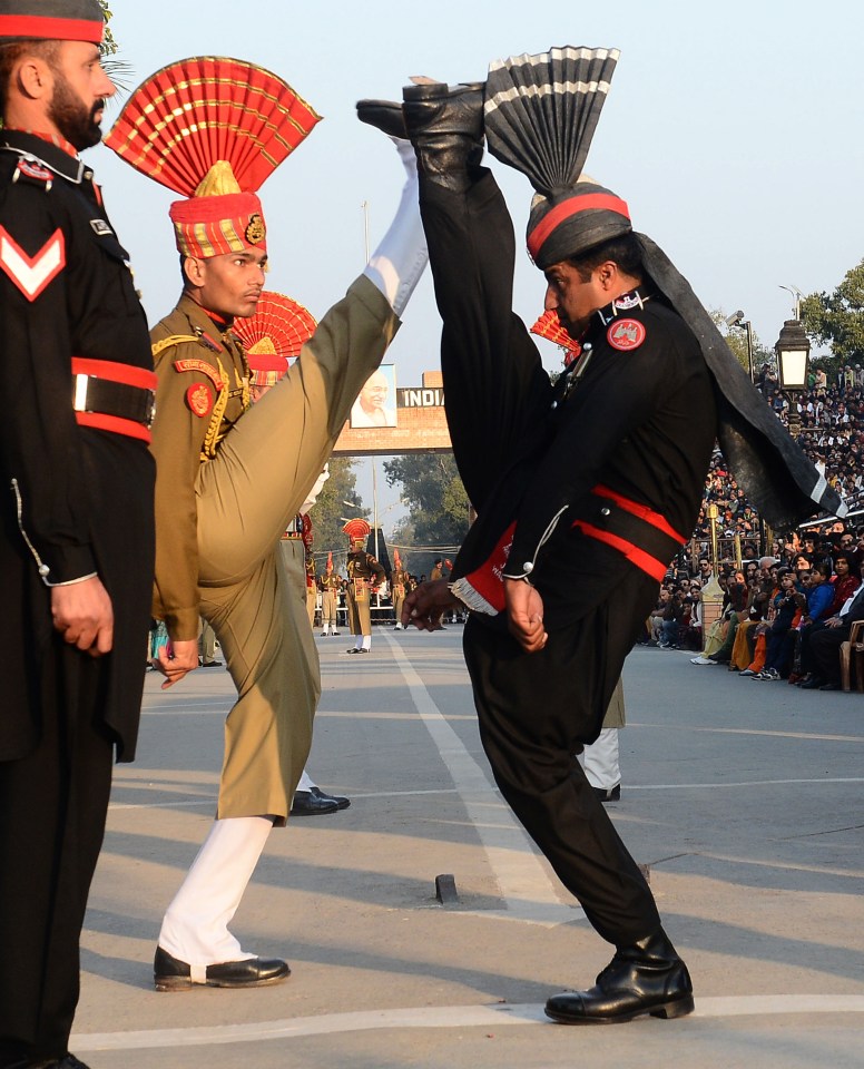  The border between the two countries is closed each day in a bizarre ceremony involving soldiers from each nation