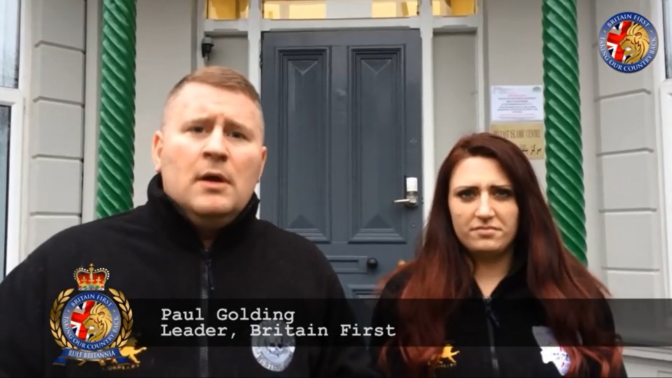  Fransen pictured with the far-right group's leader Paul Golding during a march