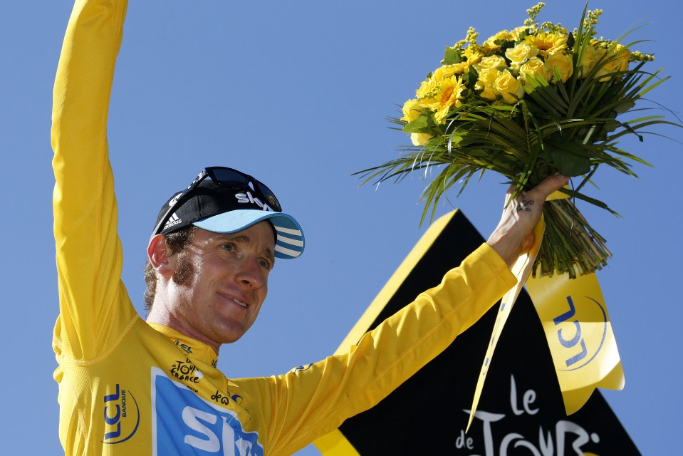  Bradley Wiggins celebrates in the Yellow Jersey after winning the 2012 Tour de France