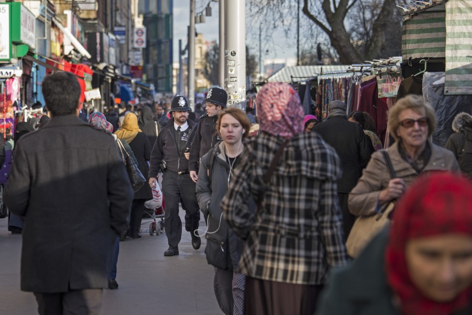 Crowds flock to market stalls and the high street in London