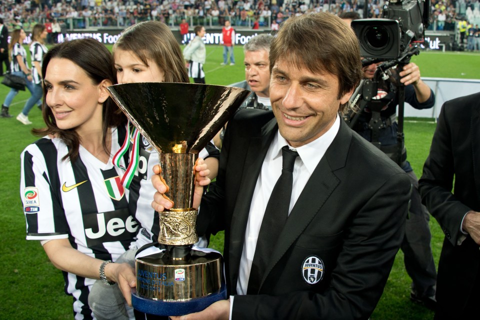 Antonio Conte celebrates a Serie A title success with Juventus with wife Elisabetta and daughter Vittoria