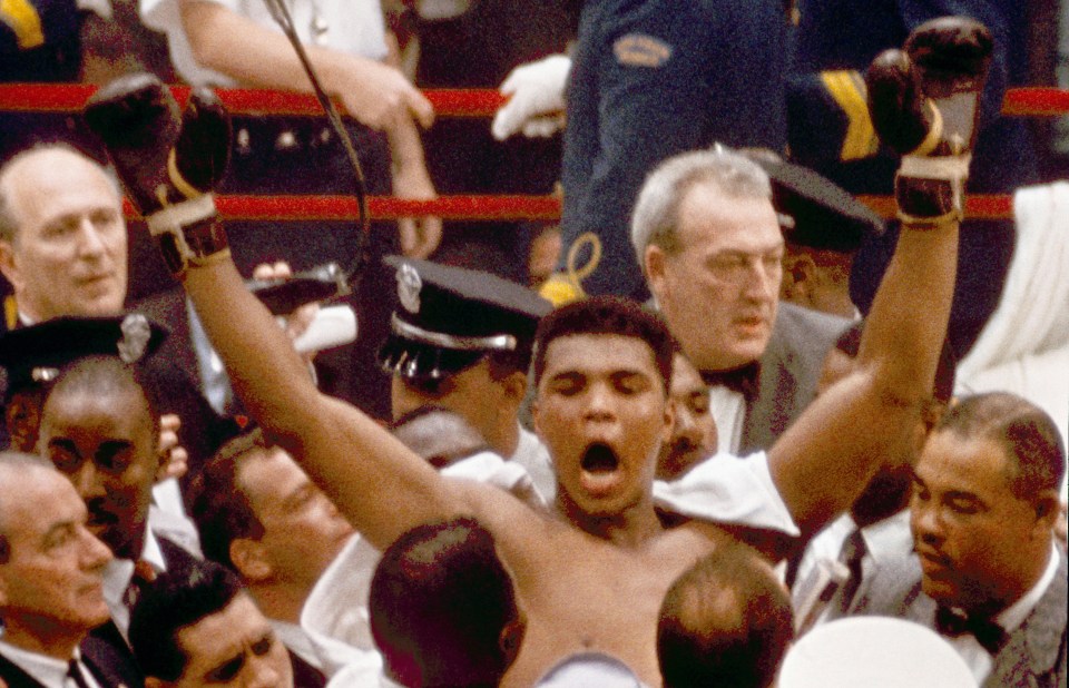 FILE - In this Feb. 25, 1964, file photo, Muhammad Ali, or Cassius Clay at the time, strikes a familiar pose as he shouts "I am the greatest," as he leaves the ring, arms raised, following his defeat of former heavyweight boxing champion Sonny Liston, in Miami Beach, Fla. Ali, the magnificent heavyweight champion whose fast fists and irrepressible personality transcended sports and captivated the world, has died according to a statement released by his family Friday, June 3, 2016. He was 74. (AP Photo/File)