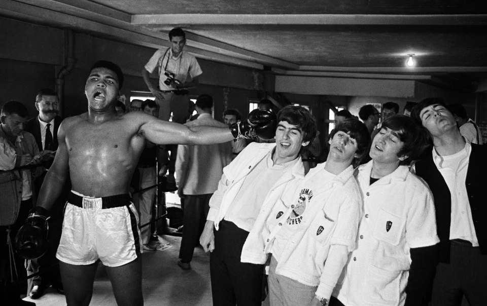 American heavyweight boxer Cassius Clay (later Muhammad Ali) takes on the Beatles (from left to right, George Harrison, Ringo Starr, John Lennon and Paul McCartney) in Miami, during the run-up to his title fight against Sonny Liston, 22nd February 1964. (Photo by Chris Smith/Popperfoto/Getty Images)