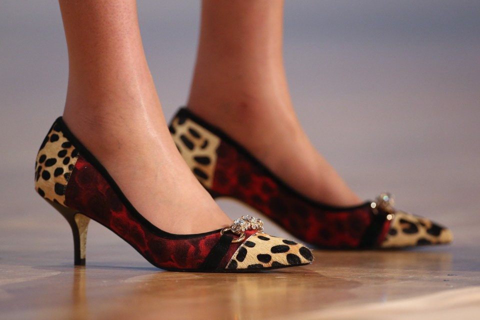  Lesser spotted . . . Theresa May in those now infamous leopard print stilettos at the Conservative Party Conference