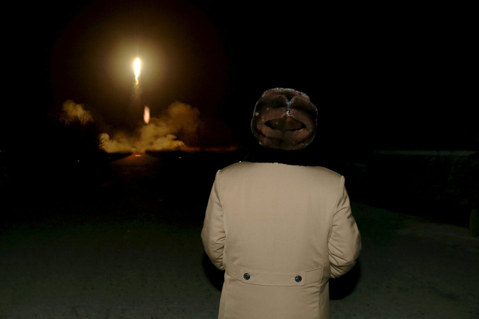  A delighted Kim watches a ballistic rocket test