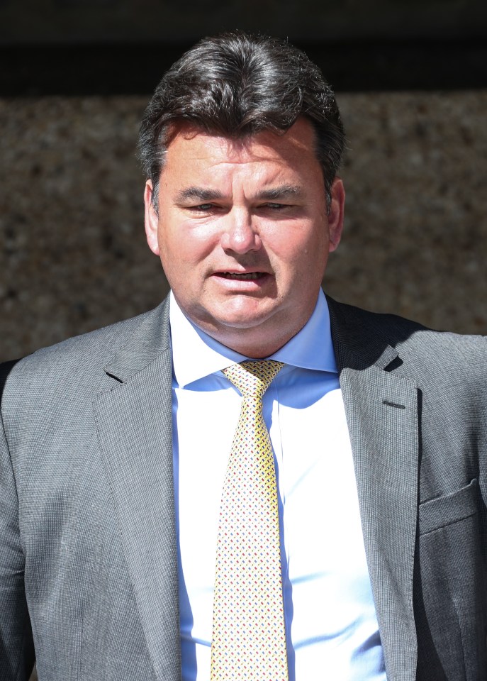 Dominic Chappell leaves court after being banned from driving for six months earlier this year