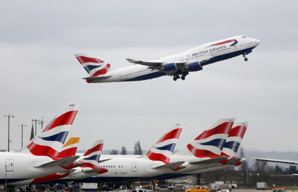 Flights Operated By British Airways Carry Passengers At Heathrow Airport