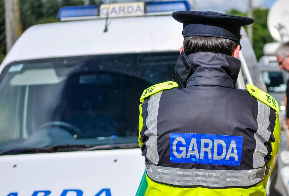 Bailieborough, County Cavan, Republic of Ireland, 6th September 2013 - A Garda officer watches two forensics officers outside the home of 54 year-old Patricia Kierans where her body was discovered. She had been "violently murdered" ¿ Stephen Barnes