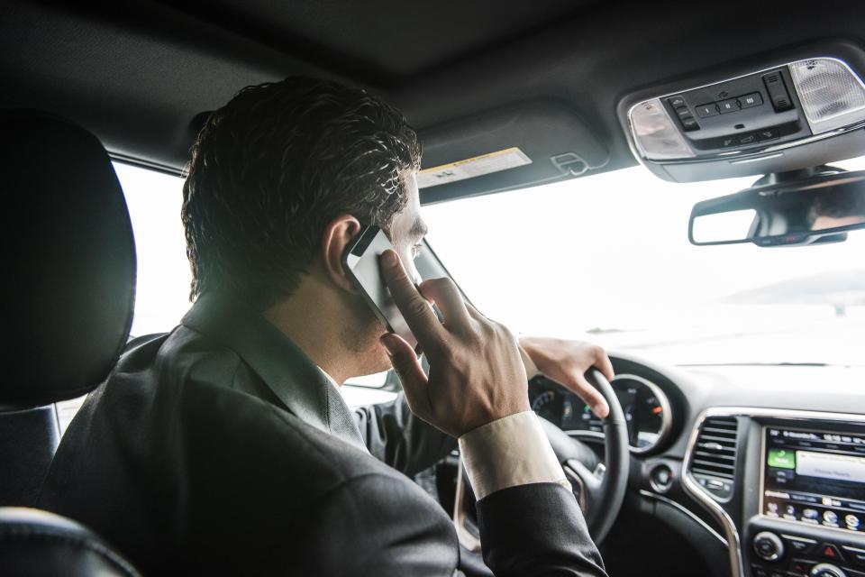  Using a mobile phone at the wheel is as bad as drink-driving, according to PM