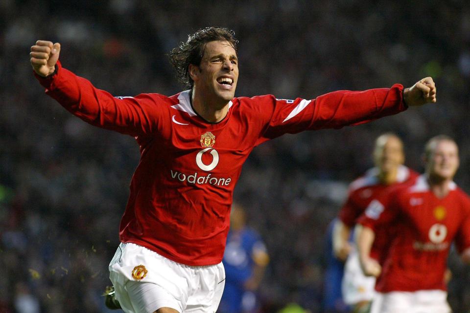 File photo dated 24-10-2004 of Manchester United's Ruud Van Nistelrooy celebrates scoring his penalty in his team's 1-0 victory against Arsenal. PRESS ASSOCIATION Photo. Issue date: Monday September 26, 2016. Arsenal's unbeaten run ended at 49 in the infamous ''Battle of the Buffet'' at Old Trafford, and it signalled another momentum swing as United regained the title. See PA story SOCCER Wenger Seasons. Photo credit should read Martin Rickett/PA Wire. THIS PICTURE CAN ONLY BE USED WITHIN THE CONTEXT OF AN EDITORIAL FEATURE. NO WEBSITE/INTERNET USE UNLESS SITE IS REGISTERED WITH FOOTBALL ASSOCIATION PREMIER LEAGUE.