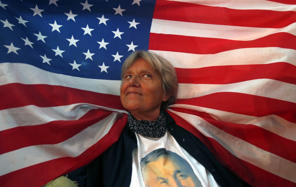  A supporter of pro-American Mr Djukanovic holds the Stars and Stripes during celebrations after October's parliamentary elections