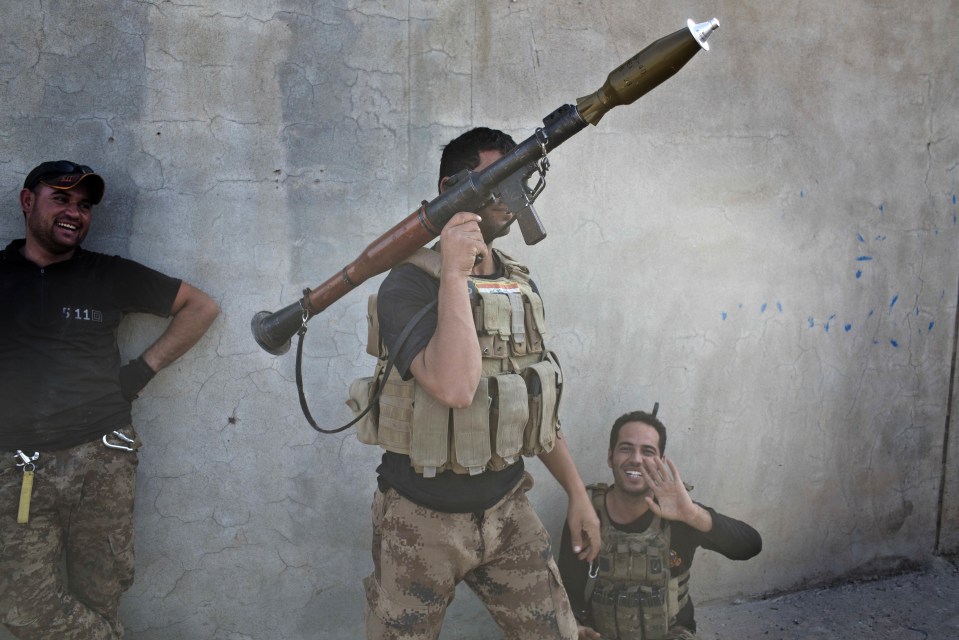  An Iraqi special forces soldier holds a rocket propelled grenade launcher south east of Mosul