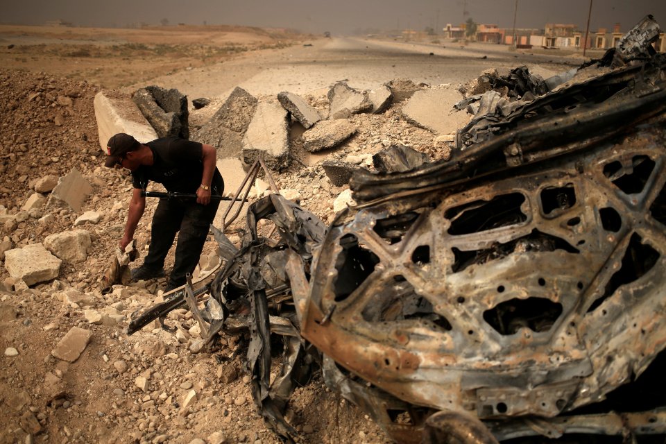  A member of Iraqi special forces at the site of an ISIS suicide attack east of Mosul