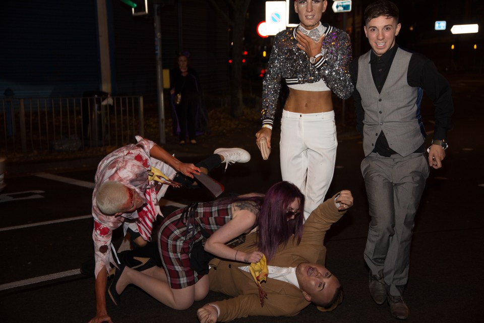  The whole group ended up sprawled in the street