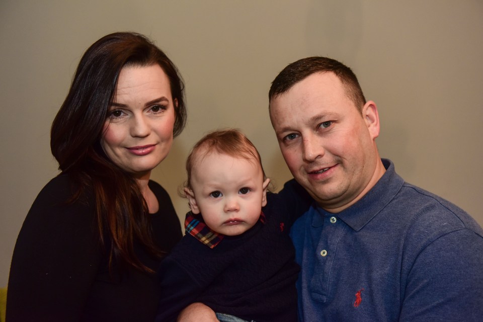  Joanne and Neil, with one-year-old son Parker, have told of their joy at being cleared of raping a woman