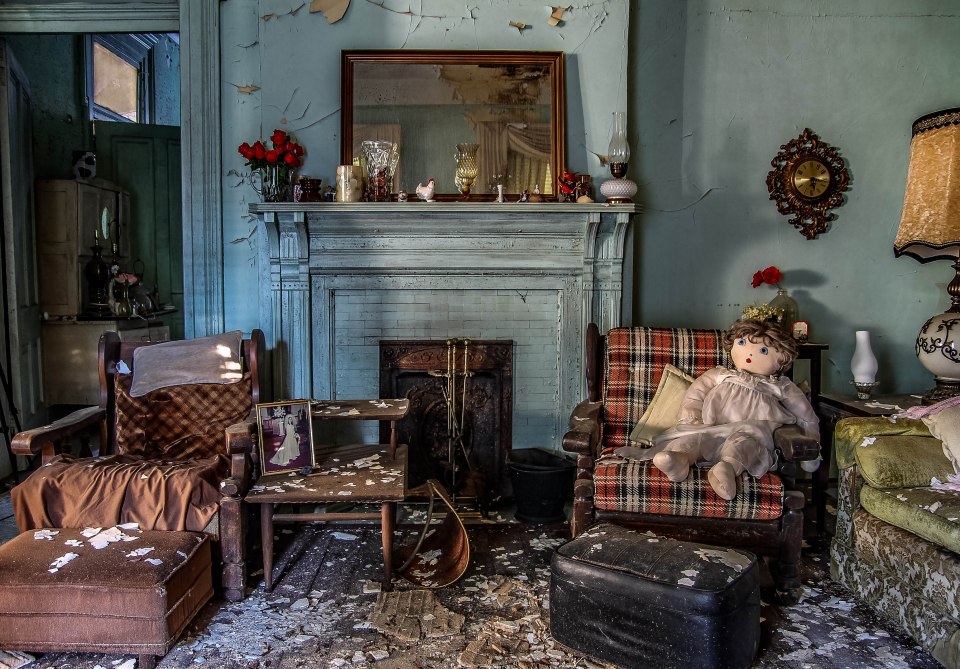 Paint is peeling off the walls, a sign the home has been untouched for decades