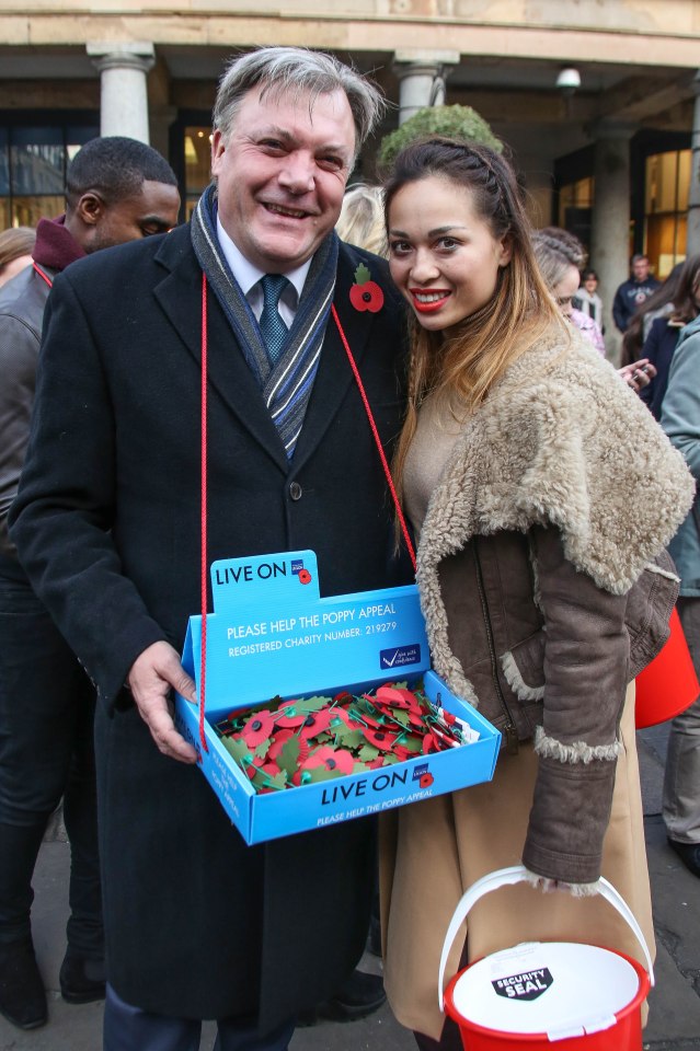 Former shadow chancellor Ed Balls donned a box full of the red flowers around his neck with his dance partner Katya Jones