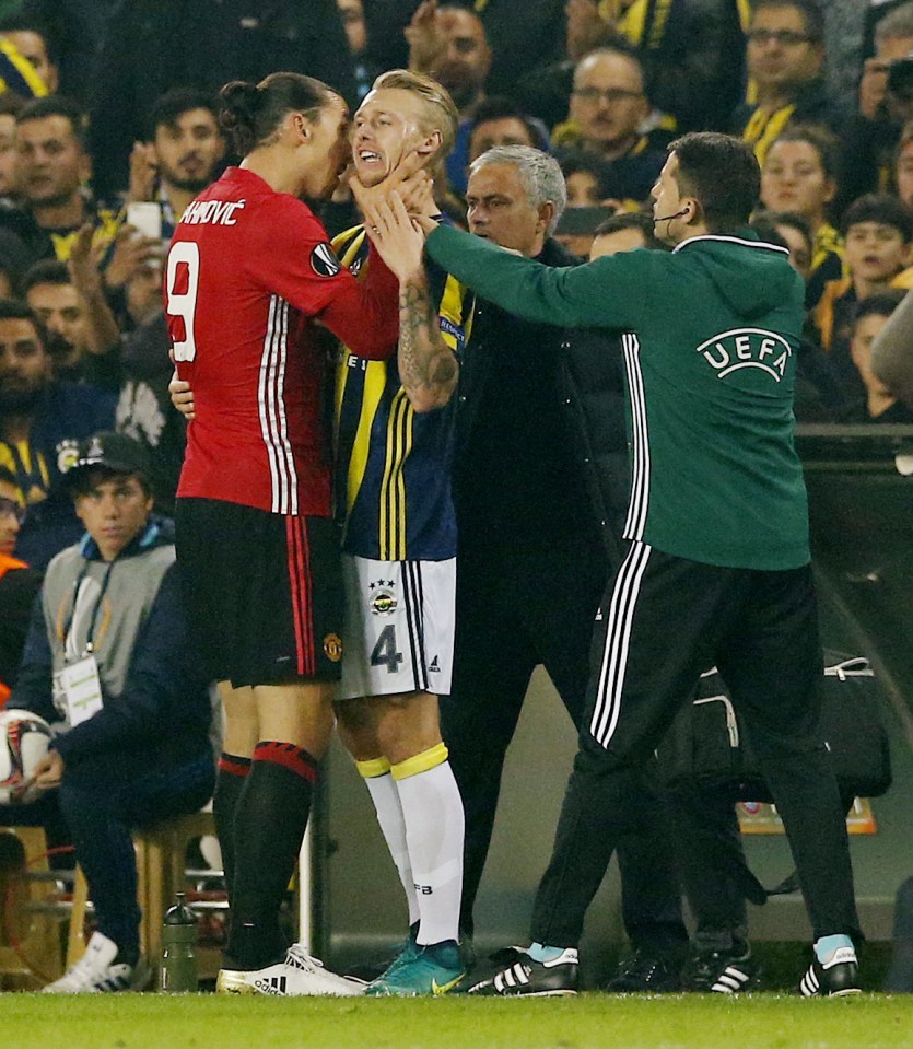  Zlatan Ibrahimovic reacts to a shove by Fenerbahce's Simon Kjaer